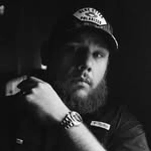 Luke Combs from country singer, an AI character on folk