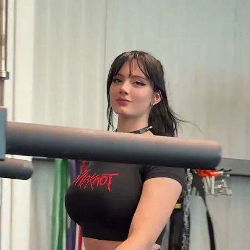 Athena Kami from goth cosplay and fitness online creator, an AI character on folk