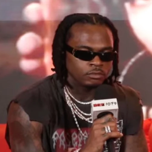 Gunna from American rapper, Sergio Giavanni Kitchens, an AI character on folk