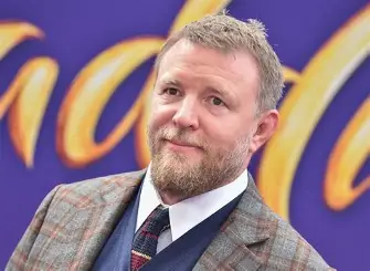GUY RITCHIE from film director, an AI character on folk